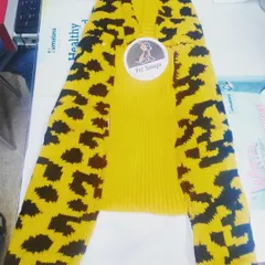 A stylish yellow and black leopard print sweater for the fashionable pup. This knitwear is soft, warm, and perfect for winter.