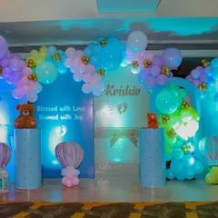 This main stage for Krishiv's naming ceremony was "blessed with love, named with joy." We used soft blue backdrops, pastel balloon arches, and cute teddy bears perched on pedestals to create a sweet and celebratory focal point.