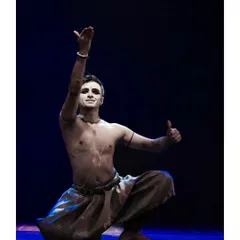 A candid shot from a solo performance, giving a thumbs up to the audience. It's important to me to connect with the people who come to watch.