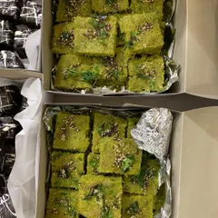 A close-up of the Pani Puri Dhokla and Double Chocolate Brownies I served as part of a dinner for 50 people. A unique twist on a classic snack.