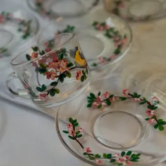 Your daily chai deserves a beautiful cup. I painted these delicate glass cups and saucers with a cherry blossom and bird design, perfect for making your tea time a little more special.