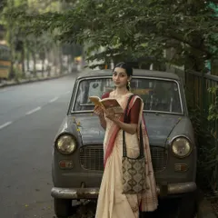 I love shoots that have a nostalgic feel. Posing with this vintage car on a quiet Bengaluru street, we created a story that feels like a moment paused in time. It shows my versatility in creating character-driven portraits for lifestyle and fashion brands.