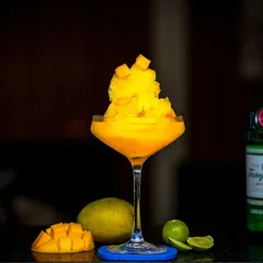 A taste of tropical bliss. Our Mango Margarita is a refreshing and fruity cocktail, perfectly crafted to transport you to a summer paradise with every sip.