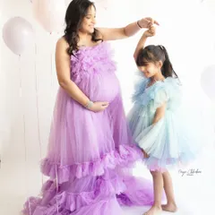 A maternity session is even more special when a big sister or brother is waiting to meet the new baby. This is a portrait of a family growing, filled with anticipation and love.