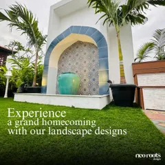 This view showcases the grand presence of the Moroccan fountain in the garden. Flanked by palm trees, this feature serves as a dramatic and welcoming focal point near the entrance of the home.