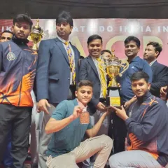 Celebrating a huge team win at the India Open International Championship. Holding this trophy is a reward for countless hours of practice and dedication.