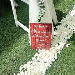 We believe in personal touches that hold deep meaning. This custom sign was created to honor loved ones watching from heaven, adding a heartfelt and emotional element to the wedding day.