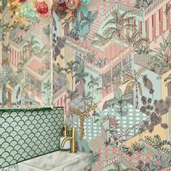A tribute to tropical grandeur, the 'Miami' wallpaper from Cole & Son features joyful tiers of terraced colonnades in a pastel palette. This design creates a kaleidoscope of architectural and botanical exuberance in this stylish powder room.