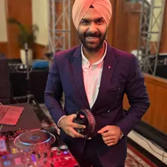Suited up and ready to get the party started at a formal event. As a professional DJ, adapting my style to the event's atmosphere is key, from the music to the attire.