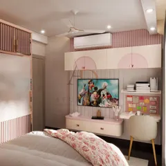 A close-up of the TV and study area in a princess-themed room, featuring playful pink accents and practical, floating storage.