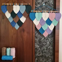 Macrame muse, leafy dreams. Here are two of our leaf wall hangings in different custom color palettes, showcasing how we can tailor the design to fit your home's aesthetic perfectly.