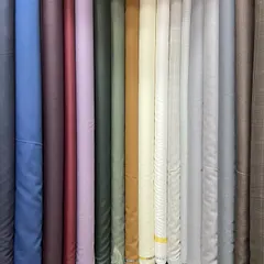 I stock a wide variety of high-quality suiting fabrics from trusted brands like Siyaram and Raymond. You can browse through solids, textures, and patterns to find the perfect material for your suit or blazer.