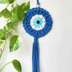 Another shot of the Evil Eye, showing its clean, simple design. The concentric circles of blue, white, and black are instantly recognizable.