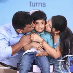 A moment of overwhelming love for the birthday boy. Surrounded by his parents, he gets sweet birthday kisses, a memory perfectly captured by our photographer.