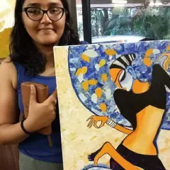 This student explored a modern Indian aesthetic, creating a beautiful painting of a dancer using texture and a unique color palette.