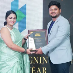 We were honored to be named the "Creative Designing Firm of the Year" by the Global Pride Awards. Our founder, Haricharan KV, is seen here accepting the award, a recognition of our team's dedication to innovative design.