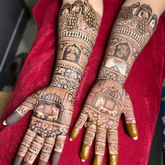 This royal bridal mehendi features majestic elephants in a procession, auspicious kalash symbols, and graceful peacocks. It's a design fit for a queen, covering the hands and arms in rich detail.