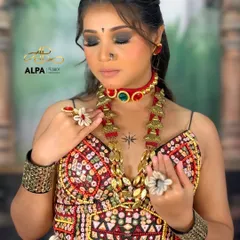 This shot with eyes closed highlights the intense black smokey eyeshadow, blended perfectly for a dramatic effect. It's a key feature of my Garba makeup style.