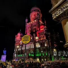 The magnificent BMC building illuminated in the Indian tricolor at night, a stunning example of heritage architecture lighting.