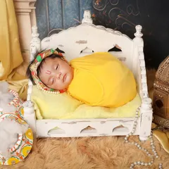 For families wanting to honor tradition, I offer special themed shoots like this 'Little Krishna' setup. We create a divine and beautiful scene to celebrate your little one in a culturally rich and memorable way.