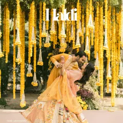 Therein bloomed a love as bright as the marigolds surrounding them. The Haldi ceremony is a celebration of pure joy, and I focus on capturing the candid laughter and playful romance that make these pre-wedding rituals unforgettable. This portrait showcases the vibrant energy and tradition of a classic Haldi celebration.