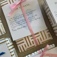 The personal touch is what matters most. These Rakhi gifts are wrapped with custom notes for each sister, featuring a heartfelt message to make them feel truly special.