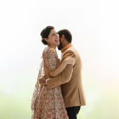 We believe the best portraits are born from genuine emotion. Wirla's spontaneous laughter as Jibran whispers in her ear is a perfect example of the unposed, joyful moments we aim to capture.