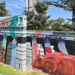 Different angles of the Wall Street and Broadway inspired sections of the Sobha mural. The piece combines hyper-realistic architecture with bold, colorful overlays, capturing the dynamic spirit of Manhattan.