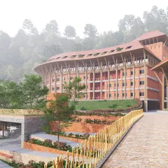 This render shows the university's architectural response to the mountainous site, with buildings nestled into the hillside. The use of natural materials and extensive landscaping helps the campus merge with its environment, minimizing its visual and ecological impact.