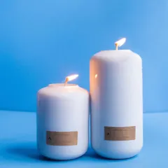 Elevate your home with fragrances that inspire vitality. My limited edition Volumetric Curve candles, shown here in white, feature a sleek design and pastel color palette to match a modern, aesthetic home.