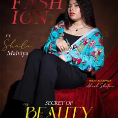 This editorial-style shot is designed to feel like a feature in a fashion magazine. The lighting, pose, and graphic elements all work together to create a polished and professional look.