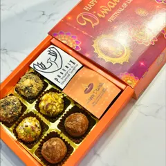 A custom corporate Diwali gift box for Phoenix. This hamper includes an assortment of my handcrafted gourmet truffles alongside branded cards for a personal touch.