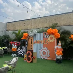 A wide view of our outdoor area set up for a construction party. We utilize the entire space to create different zones for activities, food, and photo opportunities.