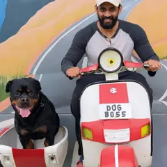 Our quirky photo spots, like this 'Dog Boss' scooter, are perfect for capturing fun memories. It's all part of the experience of being a VIP (Very Important Pet) at Therpup.