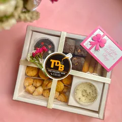 This is my Mother's Day High Tea Hamper, all beautifully wrapped and ready to gift. It’s a complete grazing box designed to make any mom feel cherished and celebrated.