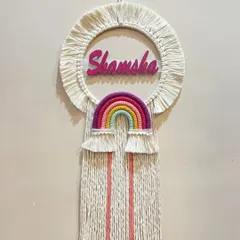 This personalized name hanging for Shamsha features a bright rainbow and colorful tassels. Customizing pieces with a child's name makes it an extra special gift they can cherish.