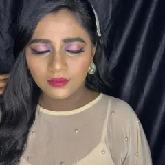A close-up of the lavender eyeshadow, showing the blending and detail work. Our makeup courses cover everything from basic application to advanced artistic techniques.