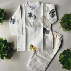 I love adding playful details to my boys' outfits. This off-white cotton kurta set features cute little embroidered elephants, making traditional wear fun for your little man. It’s simple, soft, and perfect for any celebration.