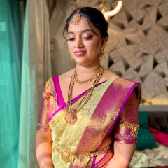 A soft and serene portrait of another South Indian bride, with glowing skin and subtle gold eyeshadow.