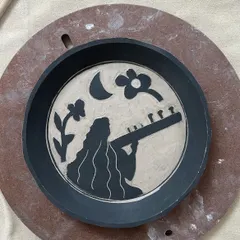 One of the three commissioned wall plates, this one celebrating a passion for music. The Sgraffito technique allows for beautiful silhouette storytelling.