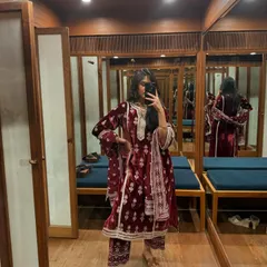 A mirror selfie moment in the maroon velvet kurta set. It's the perfect outfit for when you want to feel festive and comfortable in the colder months.
