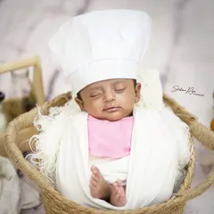Even the tiniest babies can be a little chef in the making. This newborn is dreaming of future culinary creations in this adorable themed setup.