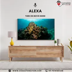 Even without a dedicated room, we can automate your living room for a cinematic feel. Here, a simple voice command to Alexa triggers the "Movie Mode," activating the TV and adjusting the environment instantly.