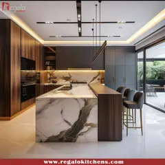 We designed this kitchen to blend natural warmth with modern sophistication. The combination of rich wood cabinetry and a veined marble island creates a space that is both inviting and luxurious. The extended countertop provides a perfect breakfast bar for casual dining.