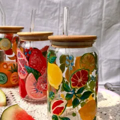 Say hello to our hand-painted summer sipper jars. Each one is painted with bright, fruity designs to make your drinks a little more joyful. These glass tumblers are perfect for everything from iced coffee to fresh juice.