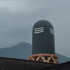 A massive Shiva Lingam against the backdrop of the Himalayan peaks. This powerful symbol of divine energy is a constant presence, reminding us of the transformative potential within and around us.