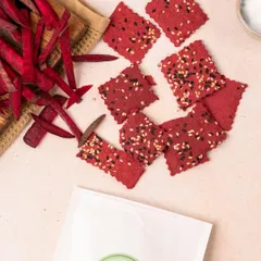 My vibrant Beetroot Crackers, made with the natural goodness of beetroot and sprinkled with sesame seeds. They are crunchy, tasty, and a great way to snack colourfully.