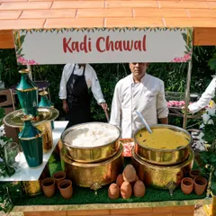A close-up of the Kadhi Chawal live station. The dish is served in traditional brass pots, and I provide earthen kulhads for an authentic serving experience.