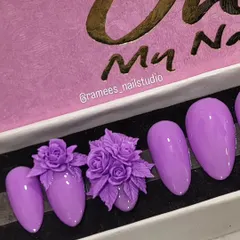 The lilac 3D rose bouquet press-on set, beautifully packaged and ready to be sent to a client.