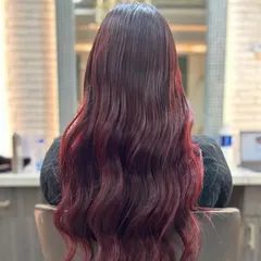 The back view of this red ombre shows the length and health of the hair. The color is rich and saturated, proving that bold color can also look incredibly luxe.
